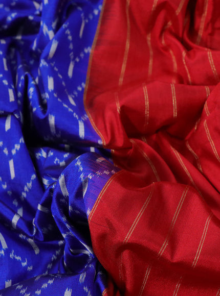 Pochampally silk saree blue and red with allover ikat weaves and ikat style zari woven border