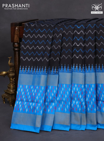 Pochampally silk saree black and cs blue with allover ikat weaves and long rettapet zari woven ikat style border