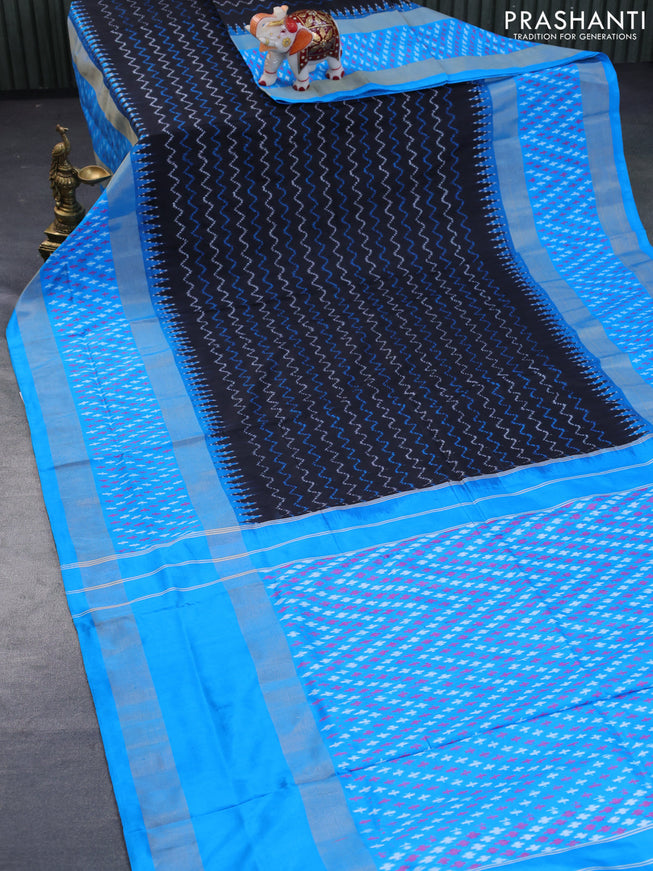 Pochampally silk saree black and cs blue with allover ikat weaves and long rettapet zari woven ikat style border