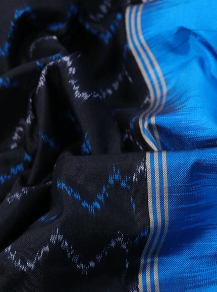 Pochampally silk saree black and cs blue with allover ikat weaves and long rettapet zari woven ikat style border