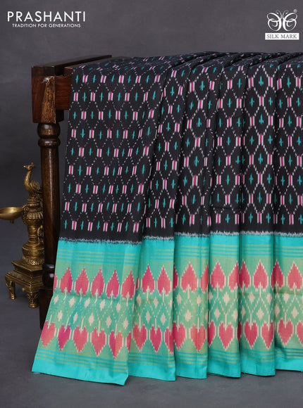 Pochampally silk saree black and teal green with allover ikat weaves and ikat style zari woven border