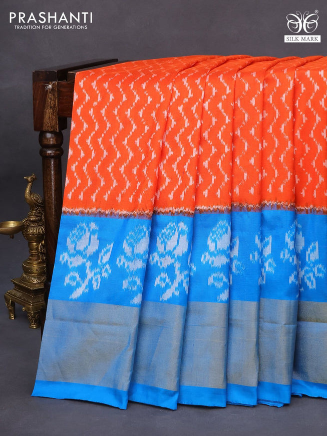 Pochampally silk saree orange and cs blue with allover ikat weaves and zari woven border