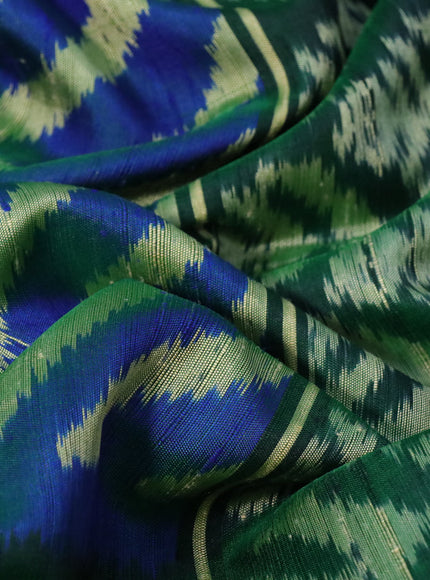 Rajkot patola silk saree dual shade of blue and green with allover ikat weaves & jute finished and zari woven border