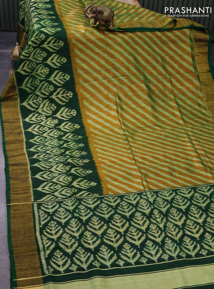 Rajkot patola silk saree mustard yellow and green with allover ikat weaves & jute finished and zari woven border