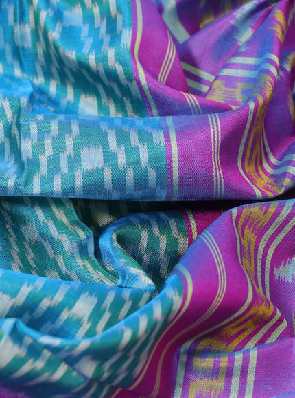 Rajkot patola silk saree teal green and dual shade of purple with allover ikat weaves and zari woven border