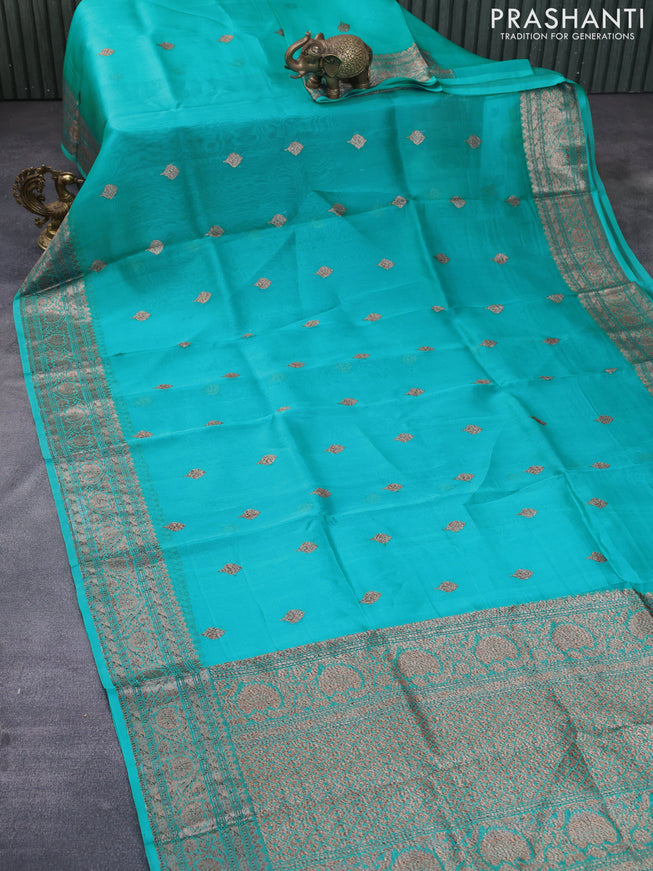 Banarasi organza silk saree teal blue with thread & zari woven buttas and banarasi style border