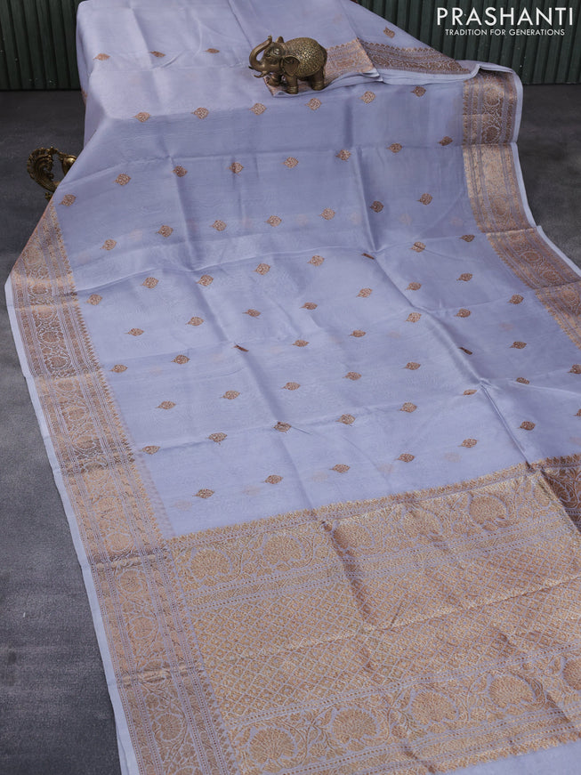 Banarasi organza silk saree grey shade with thread & zari woven buttas and banarasi style border