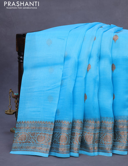 Banarasi organza silk saree teal blue with thread & zari woven buttas and banarasi style border