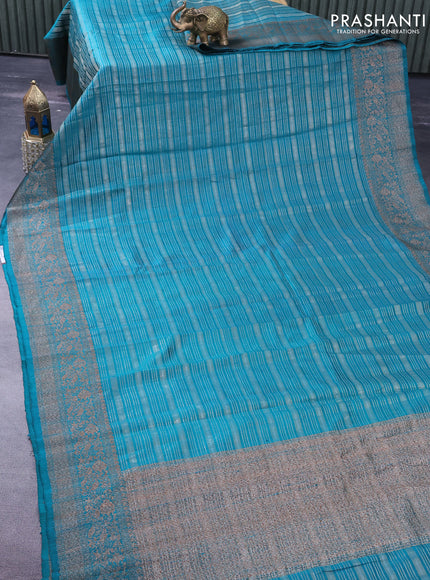 Banarasi raw silk saree teal green with allover zari stripes and woven border