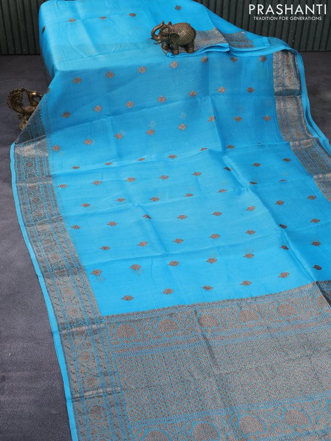 Banarasi organza silk saree teal blue with thread & zari woven buttas and banarasi style border