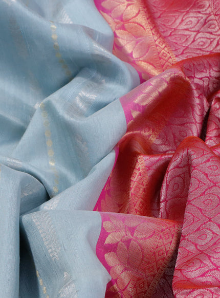 Pure raw silk saree pastel blue shade and dual shade of pinkish orange with silver & gold zari weaves and zari woven border