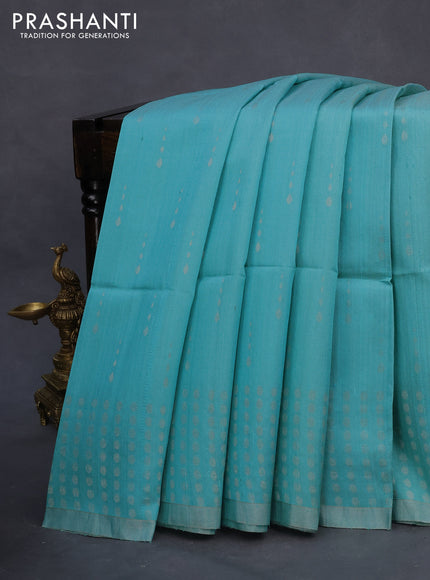 Pure raw silk saree light blue and peach pink with silver zari woven buttas and silver zari woven piping border