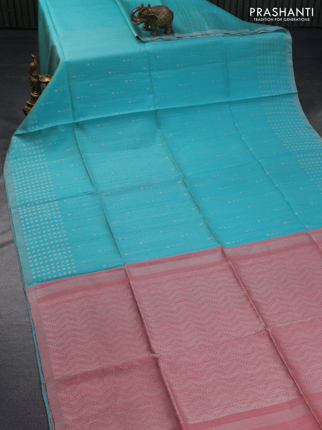 Pure raw silk saree light blue and peach pink with silver zari woven buttas and silver zari woven piping border