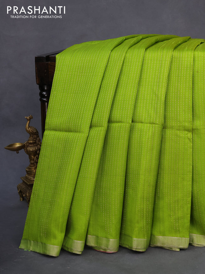 Pure raw silk saree lime green and pink with allover silver zari weaves and silver zari woven piping border