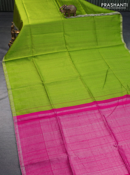 Pure raw silk saree lime green and pink with allover silver zari weaves and silver zari woven piping border