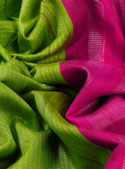 Pure raw silk saree lime green and pink with allover silver zari weaves and silver zari woven piping border