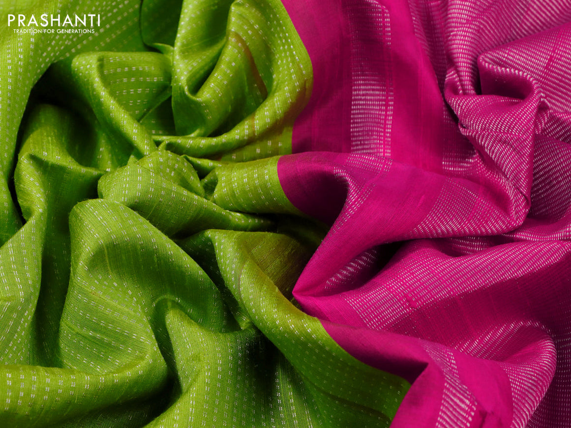 Pure raw silk saree lime green and pink with allover silver zari weaves and silver zari woven piping border