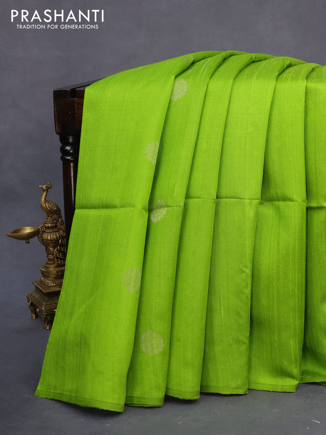 Pure raw silk saree light green and grey with silver zari woven buttas in borderless style