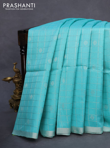 Pure raw silk saree light blue and mustard yellow with allover silver zari checks & buttas and silver zari woven border