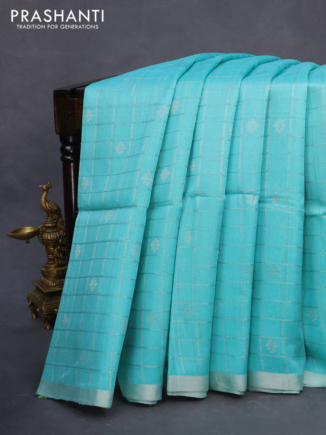 Pure raw silk saree light blue and mustard yellow with allover silver zari checks & buttas and silver zari woven border