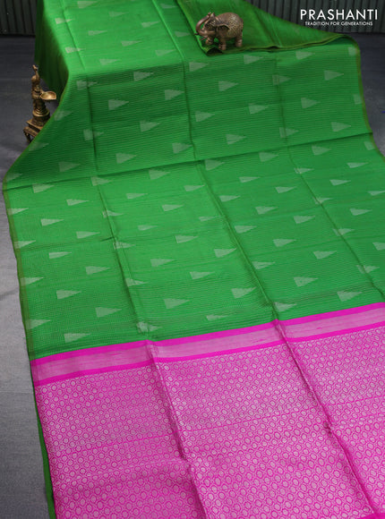 Pure raw silk saree light green and pink with allover silver zari weaves in borderless style