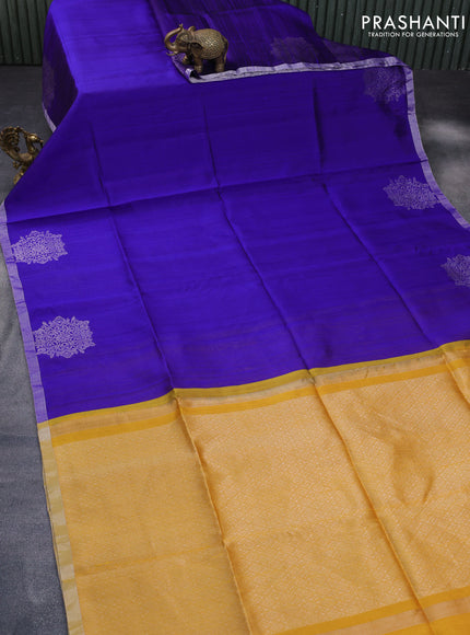 Pure raw silk saree blue and mustard shade with plain body and silver zari woven border