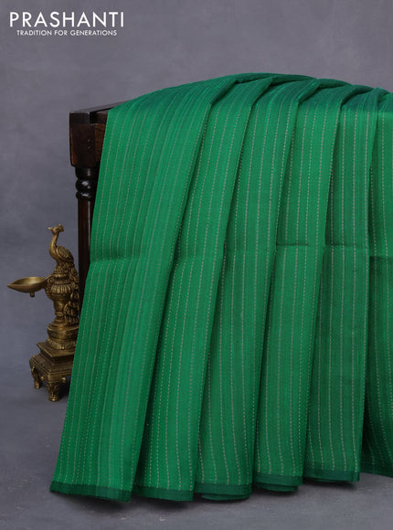 Pure raw silk saree green and light pink with allover silver zari weaves in borderless style