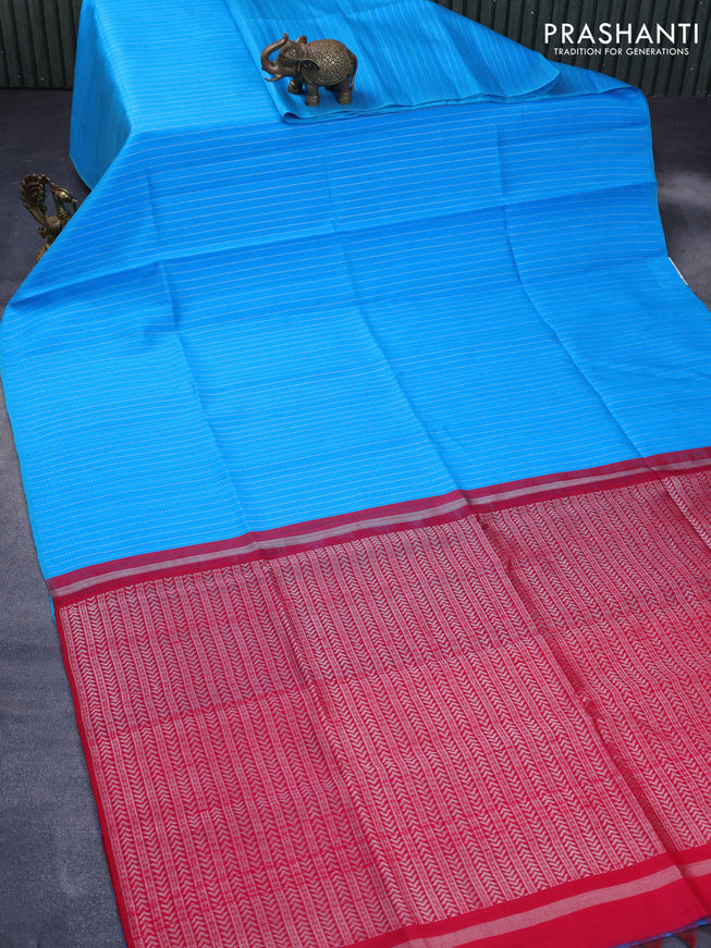 Pure raw silk saree light blue and reddish pink with allover silver zari weaves in borderless style