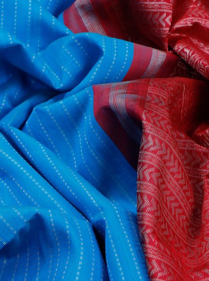 Pure raw silk saree light blue and reddish pink with allover silver zari weaves in borderless style