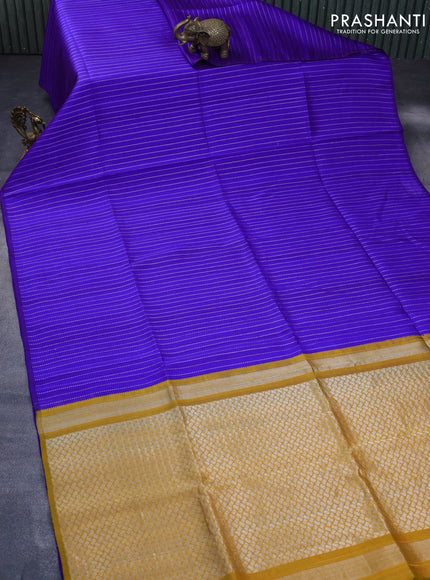 Pure raw silk saree blue and mustard yellow with allover silver zari weaves in borderless style