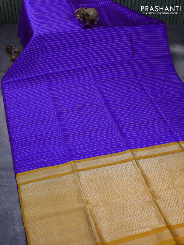 Pure raw silk saree blue and mustard yellow with allover silver zari weaves in borderless style