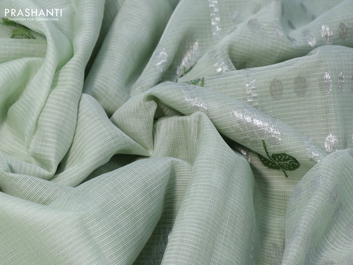 Pure zari kota silk saree pastel green shade and green with thread & silver zari woven buttas and silver zari woven simple border