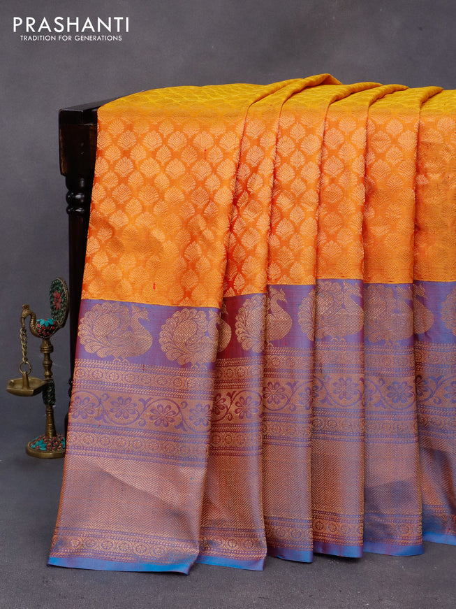 Gadwal silk saree mustard yellow and dual shade of blue with allover zari woven brocade weaves and long zari woven border