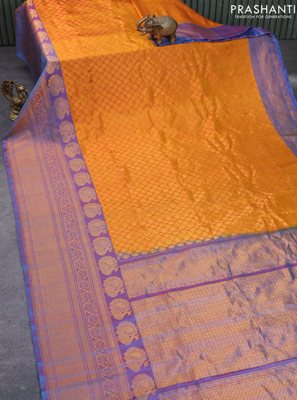 Gadwal silk saree mustard yellow and dual shade of blue with allover zari woven brocade weaves and long zari woven border