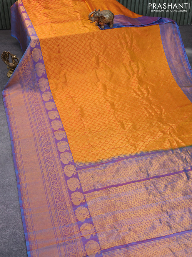 Gadwal silk saree mustard yellow and dual shade of blue with allover zari woven brocade weaves and long zari woven border