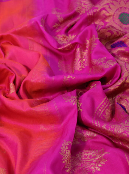 Gadwal silk saree dual shade of pinkish orange and pink with zari woven buttas and long temple design thread & zari woven border