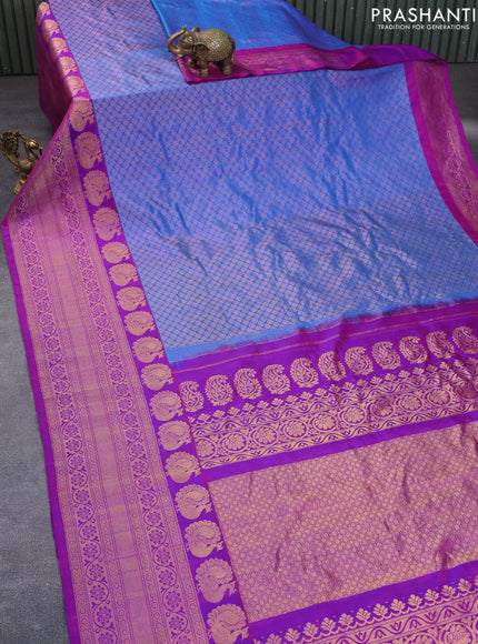 Gadwal silk saree cs blue and purple with allover zari woven brocade weaves and long zari woven border