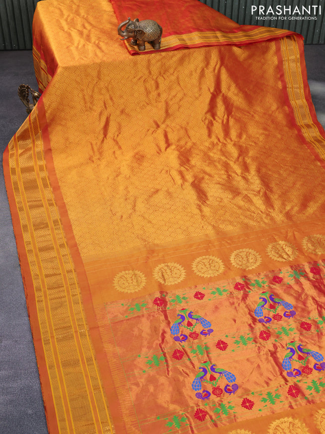 Gadwal silk saree dual shade of mustard yellow with allover zari woven brocade weaves and zari woven border & paithani design pallu