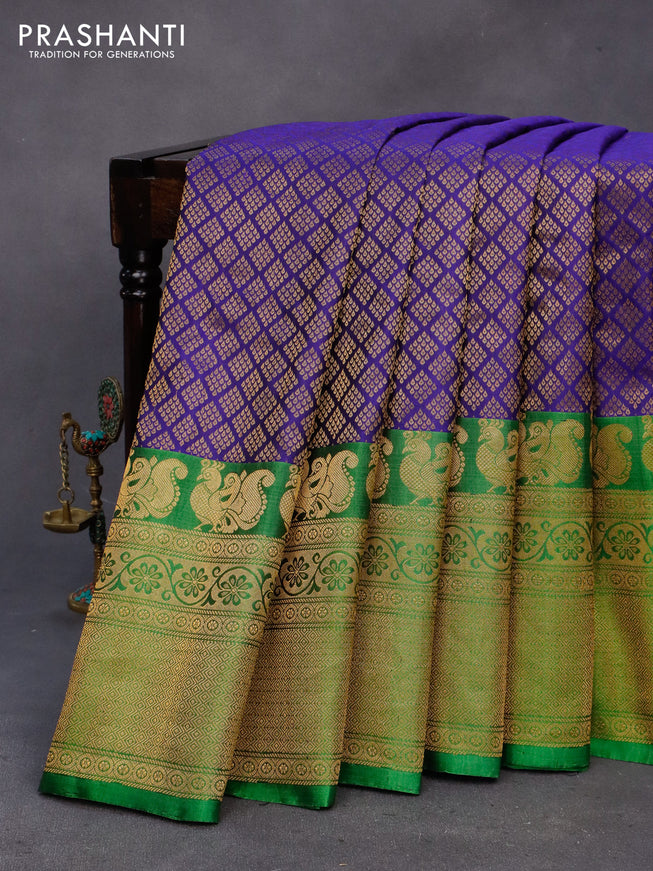 Gadwal silk saree blue and green with allover zari woven brocade weaves and long zari woven border