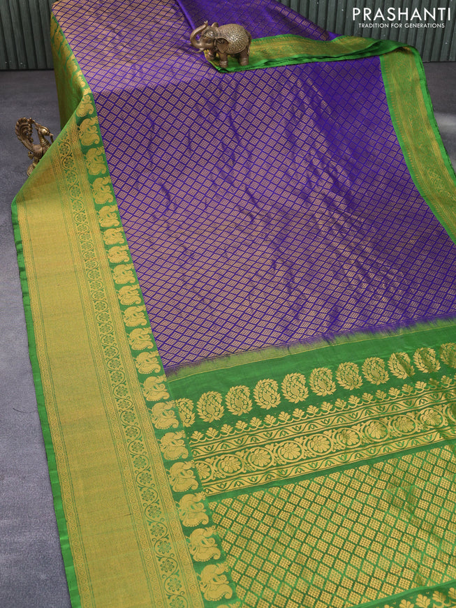 Gadwal silk saree blue and green with allover zari woven brocade weaves and long zari woven border