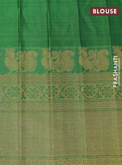 Gadwal silk saree blue and green with allover zari woven brocade weaves and long zari woven border