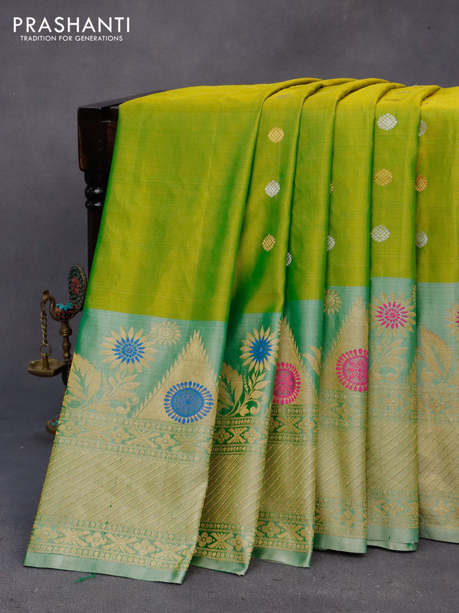 Gadwal silk saree dual shade of green and pastel green shade with silver & copper zari woven buttas and long thread & zari woven border