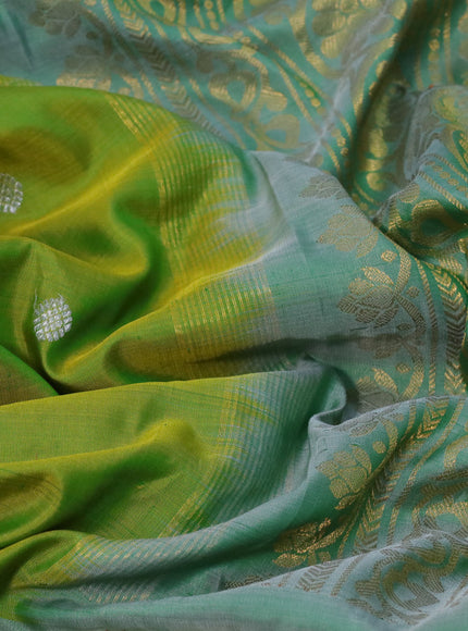 Gadwal silk saree dual shade of green and pastel green shade with silver & copper zari woven buttas and long thread & zari woven border