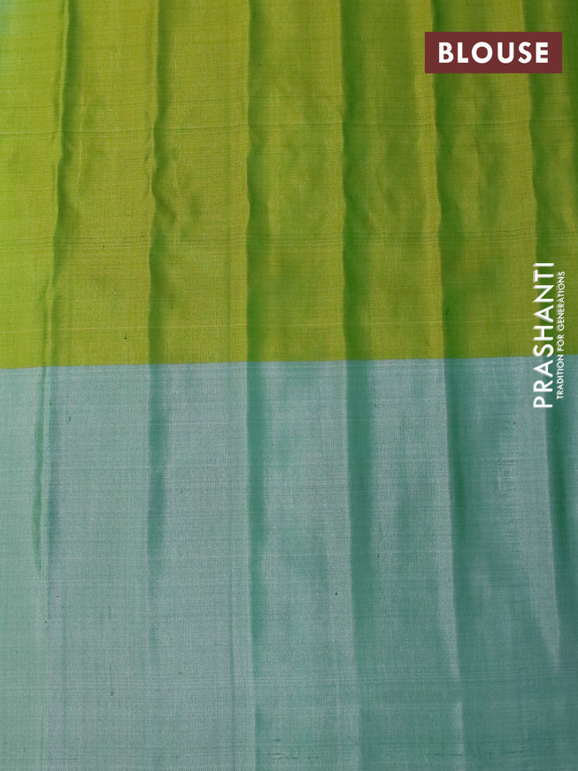 Gadwal silk saree dual shade of green and pastel green shade with silver & copper zari woven buttas and long thread & zari woven border