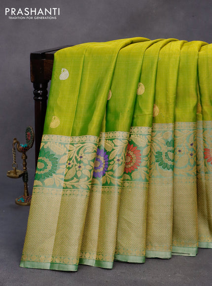 Gadwal silk saree dual shade of green and pastel green shade with silver & gold zari woven buttas and long thread & zari woven border