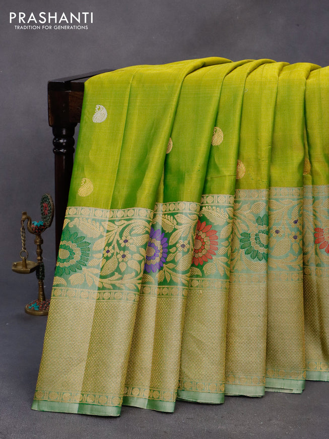 Gadwal silk saree dual shade of green and pastel green shade with silver & gold zari woven buttas and long thread & zari woven border