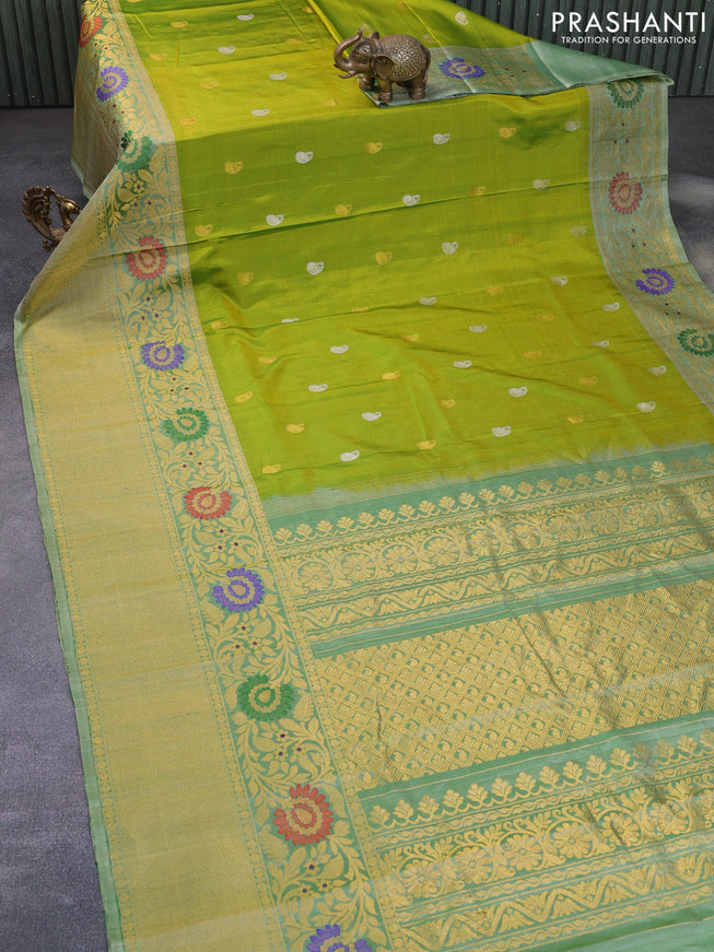 Gadwal silk saree dual shade of green and pastel green shade with silver & gold zari woven buttas and long thread & zari woven border