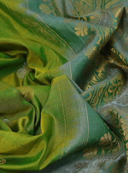 Gadwal silk saree dual shade of green and pastel green shade with silver & gold zari woven buttas and long thread & zari woven border