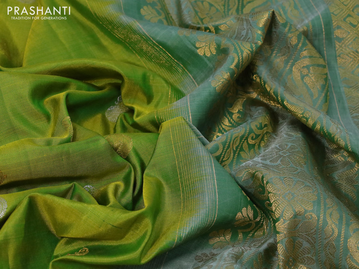 Gadwal silk saree dual shade of green and pastel green shade with silver & gold zari woven buttas and long thread & zari woven border