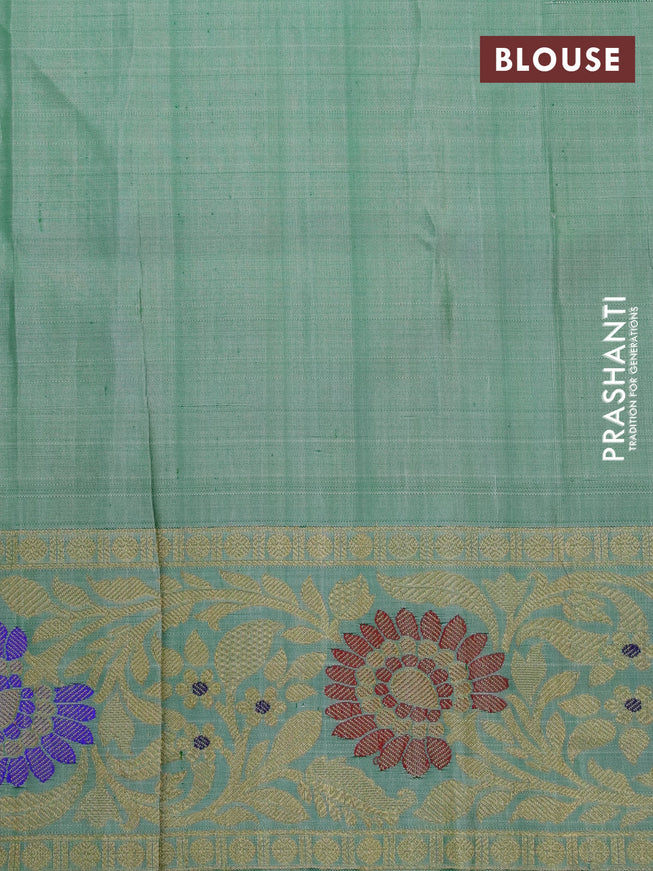 Gadwal silk saree dual shade of green and pastel green shade with silver & gold zari woven buttas and long thread & zari woven border